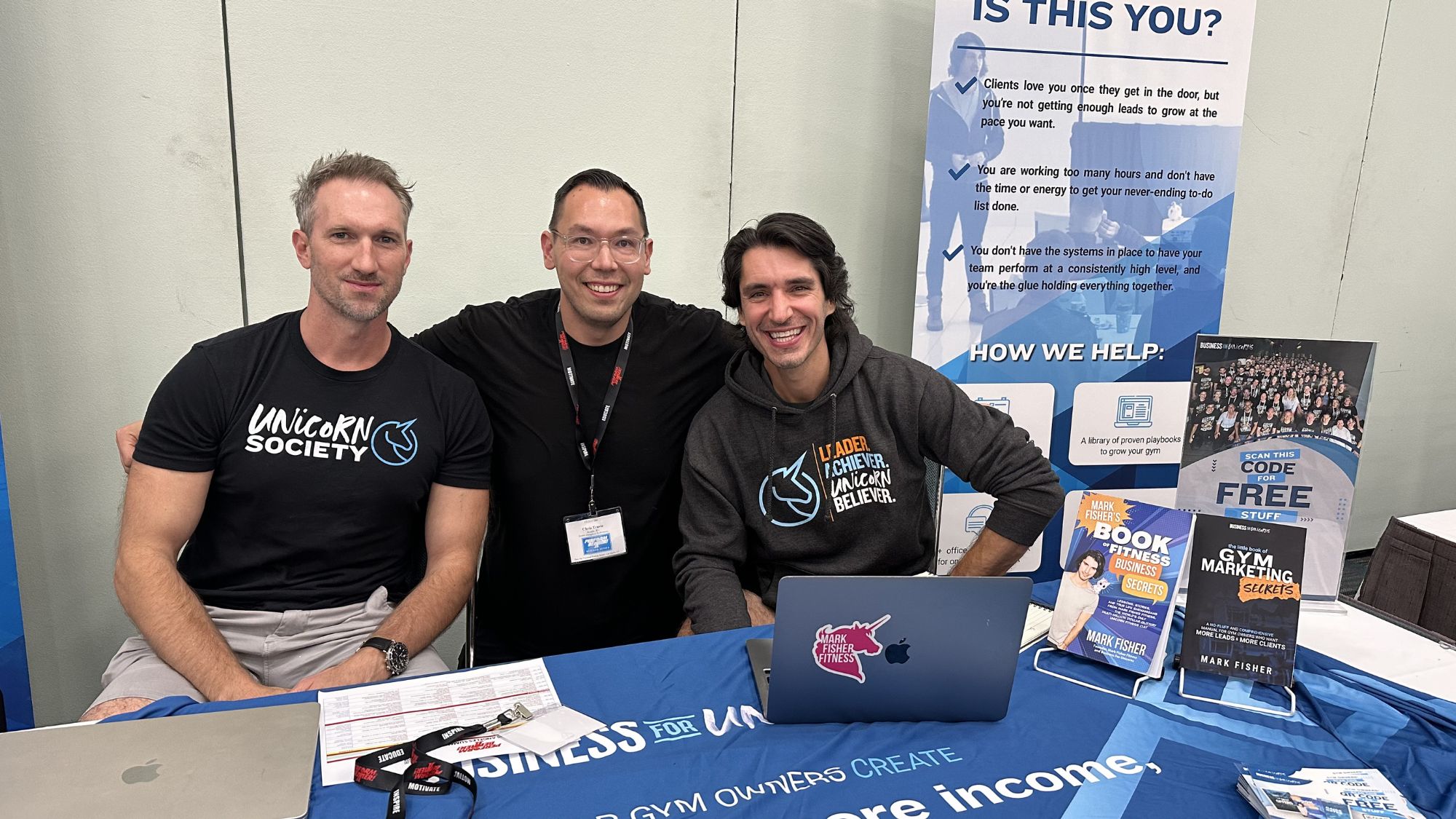 The Business for Unicorns team at an industry event with Unicorn Society branding