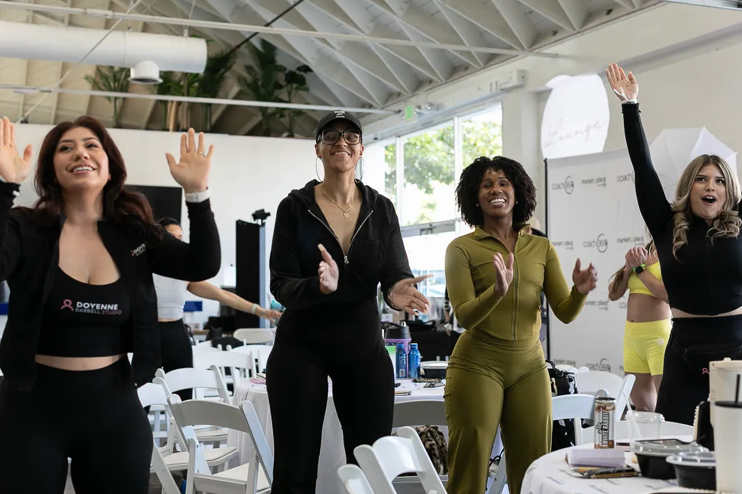 Coaches celebrating during a Career Lab session