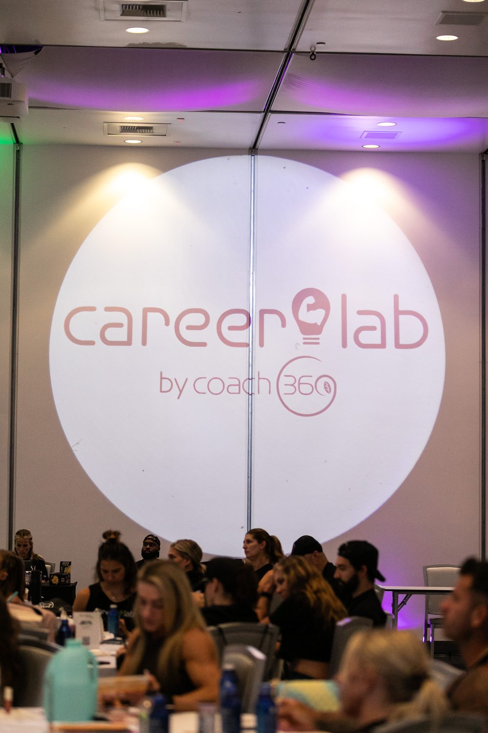 The Career Lab stage spotlight over a full room
